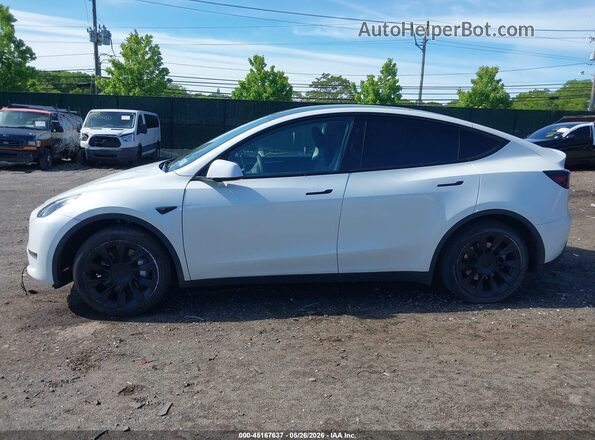 7SAYGDED1PF915696 2023 TESLA MODEL Y White ხელსაწყოთა პანელის ხედი