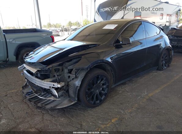 7SAYGDED1RF055737 2024 TESLA MODEL Y Gray Առջևի ձախ երեք քառորդ տեսարան