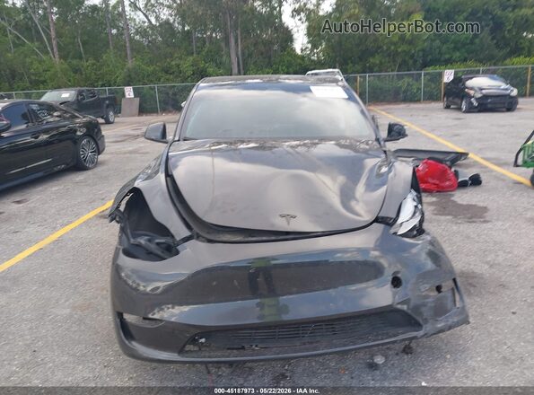 7SAYGDED1RF162285 2024 TESLA MODEL Y Gray Rear view