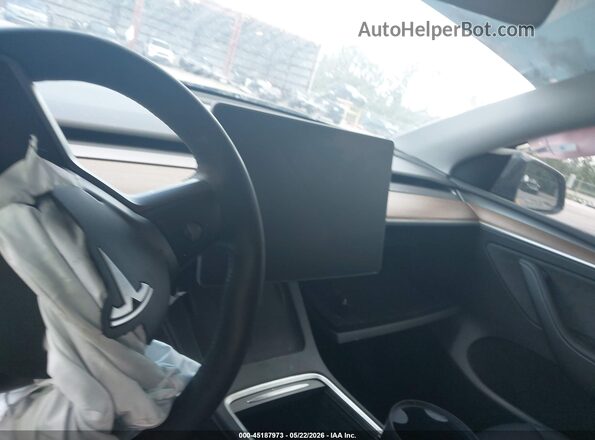 7SAYGDED1RF162285 2024 TESLA MODEL Y Gray Rear seats view