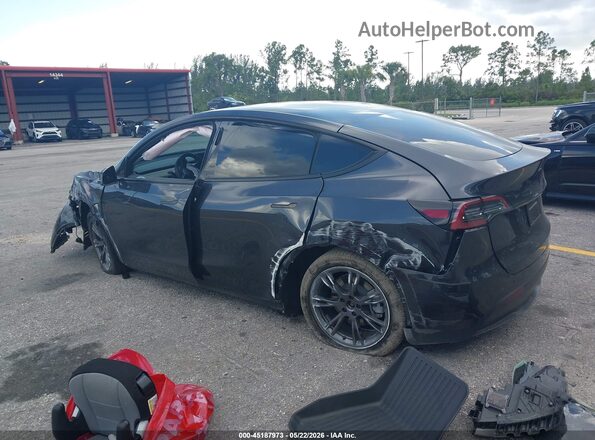 7SAYGDED1RF162285 2024 TESLA MODEL Y Gray Rear left