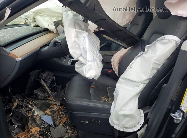7SAYGDED1SA365440 2025 TESLA MODEL Black Front interior view