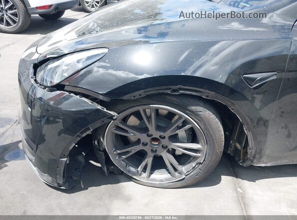 7SAYGDED1SF321375 2025 TESLA MODEL Y Black Front view