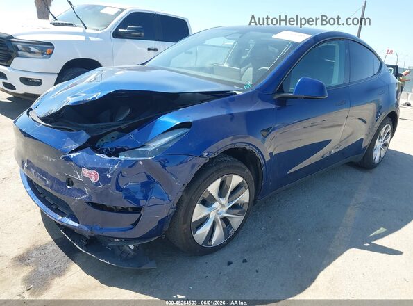7SAYGDED2RF003579 2024 TESLA MODEL Y Blue Առջևի ձախ երեք քառորդ տեսարան