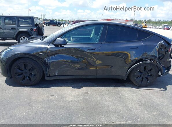 7SAYGDED2SF263289 2025 TESLA MODEL Y Gray 