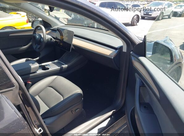 7SAYGDED2SF263289 2025 TESLA MODEL Y Gray 