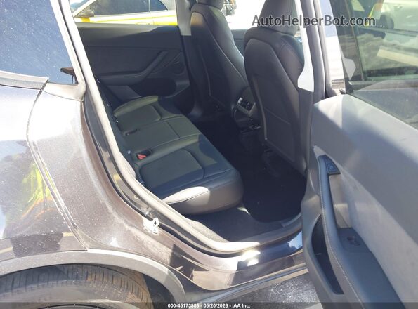 7SAYGDED2SF263289 2025 TESLA MODEL Y Gray 