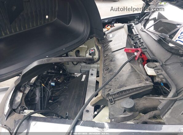 7SAYGDED2SF279122 2025 TESLA MODEL Y Gray Vista trasera