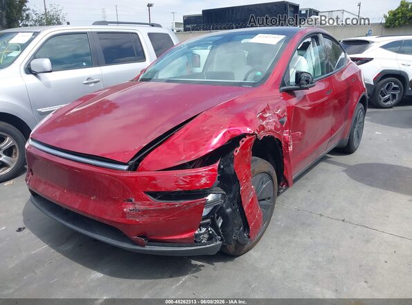 7SAYGDED2TA446898 2026 TESLA MODEL Y Burgundy წინა მარცხენა ხედი სამი მეოთხედიდან