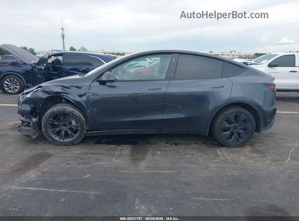 7SAYGDED3SA370803 2025 TESLA MODEL Y Gray Սալոնի հետևի տեսք