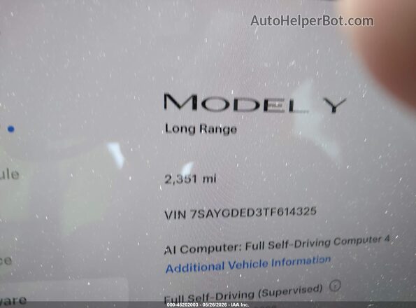 7SAYGDED3TF614325 2026 TESLA MODEL Y Gray Widok tylnych siedzeń