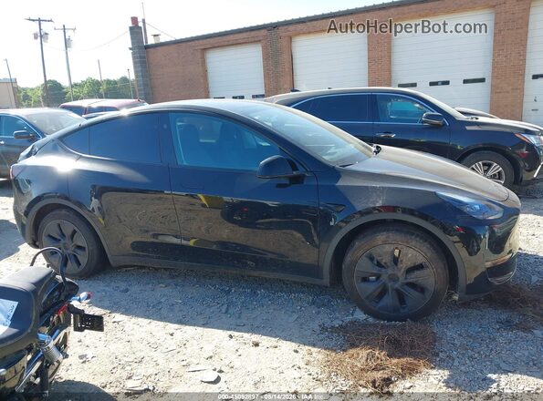 7SAYGDED4SA377551 2025 TESLA MODEL Y Gray Vista interior trasera