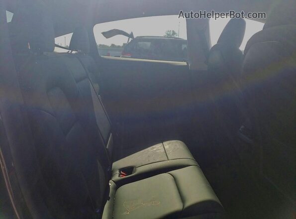 7SAYGDED6SA371234 2025 TESLA MODEL Gray Vista de los asientos traseros