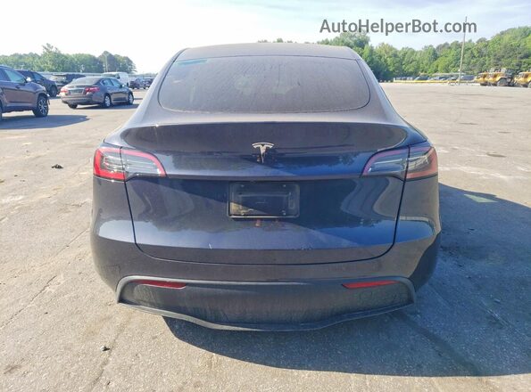 7SAYGDED6SA371234 2025 TESLA MODEL Gray Vista trasera