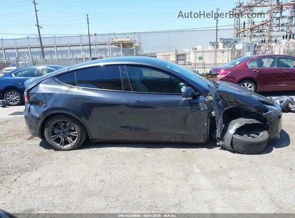 7SAYGDED6SF229808 2025 TESLA MODEL Y Black Widok wnętrza z tyłu