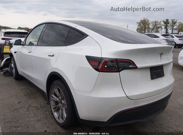 7SAYGDED7PF944426 2023 TESLA MODEL Y White Rear left