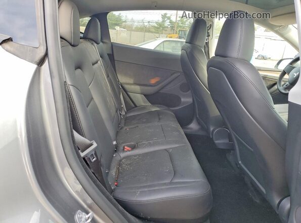 7SAYGDED8SF255309 2025 TESLA MODEL Серый Вид задней части салона