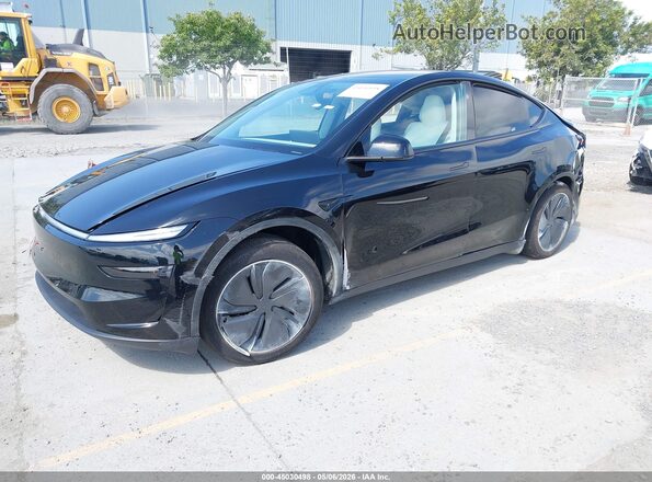 7SAYGDED8TF450795 2026 TESLA MODEL Y Black Առջևի ձախ երեք քառորդ տեսարան