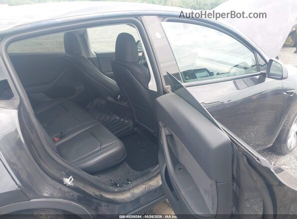 7SAYGDED9RF017950 2024 TESLA MODEL Y Gray Вид салону спереду