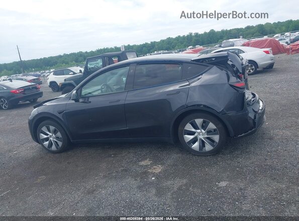 7SAYGDED9RF017950 2024 TESLA MODEL Y Gray Вид задньої частини салону