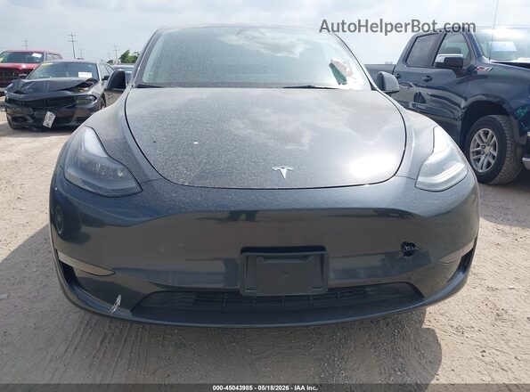 7SAYGDED9RF092793 2024 TESLA MODEL Y Gray Widok deski rozdzielczej