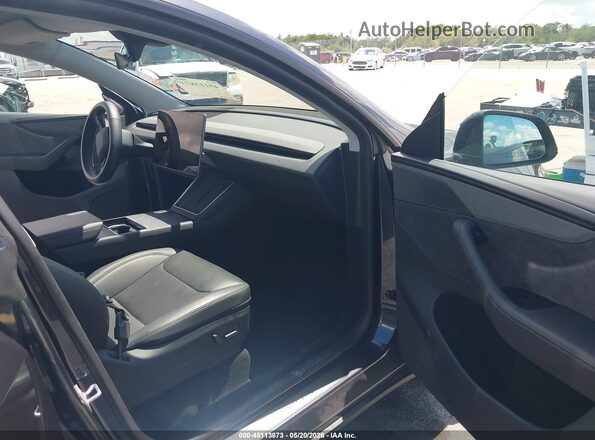 7SAYGDED9TF526704 2026 TESLA MODEL Y Gray Вид салону спереду
