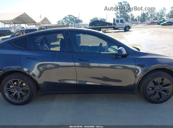 7SAYGDEDXSF269504 2025 TESLA MODEL Y Серый Вид задней части салона