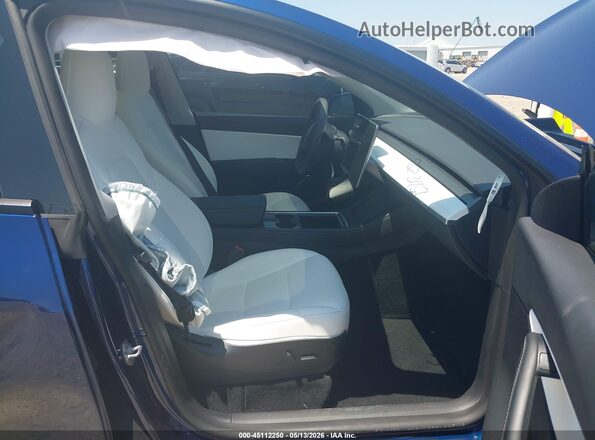 7SAYGDEE0NF505767 2022 TESLA MODEL Y Синий Вид салона спереди
