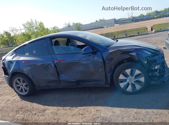 7SAYGDEE0PA174771 2023 TESLA MODEL Y Gray Vista interior trasera