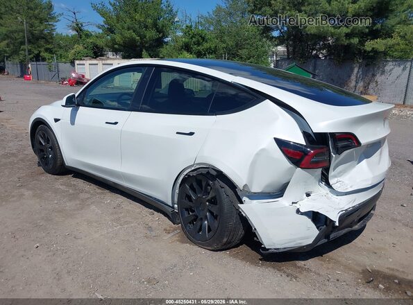 7SAYGDEE0PF598499 2023 TESLA MODEL Y White Rear left