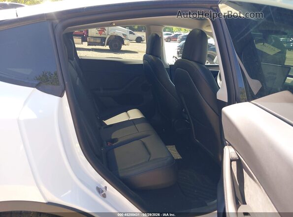7SAYGDEE0PF598499 2023 TESLA MODEL Y White VIN sticker view