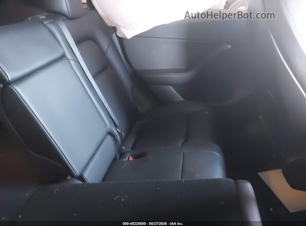 7SAYGDEE1NF317761 2022 TESLA MODEL Y White VIN კოდის სტიკერის ხედი