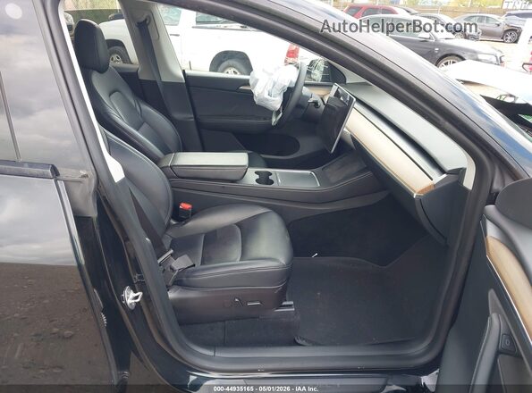 7SAYGDEE1PF667538 2023 TESLA MODEL Y Black Front interior view