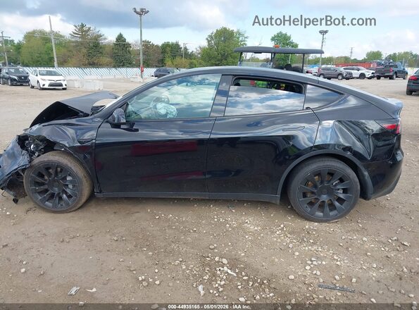7SAYGDEE1PF667538 2023 TESLA MODEL Y Black Rear interior view