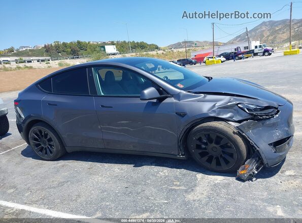 7SAYGDEE1PF891361 2023 TESLA MODEL Y Gray Սալոնի հետևի տեսք