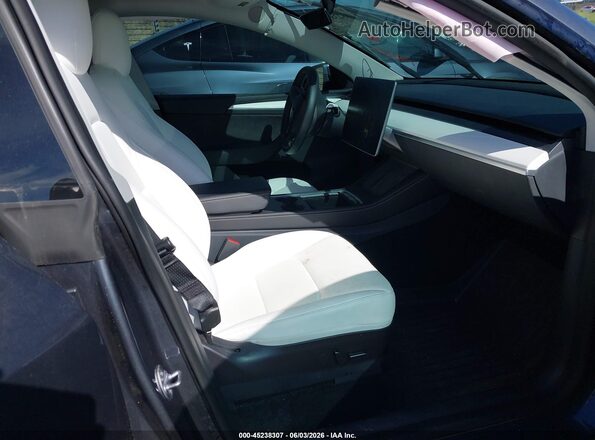 7SAYGDEE2PF629560 2023 TESLA MODEL Y Black Front interior view