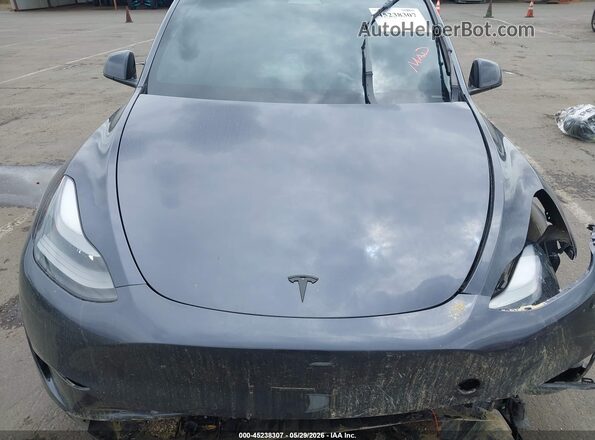 7SAYGDEE2PF629560 2023 TESLA MODEL Y Black Rear view