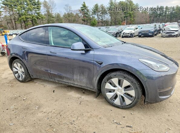 7SAYGDEE2PF863309 2023 TESLA MODEL Gray Delantero derecho