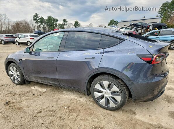 7SAYGDEE2PF863309 2023 TESLA MODEL Gray Trasero izquierdo
