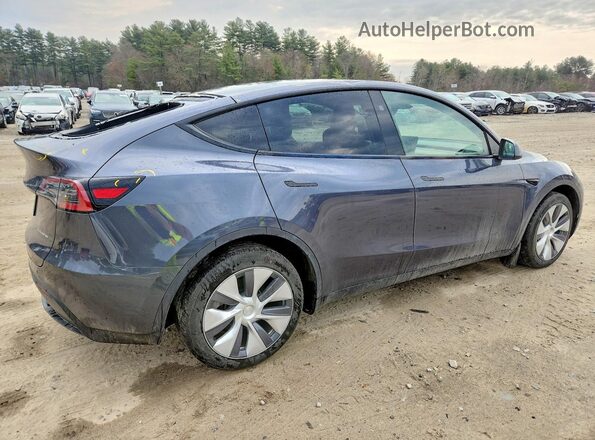 7SAYGDEE2PF863309 2023 TESLA MODEL Gray Trasero derecho