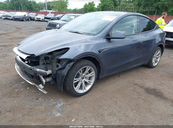 7SAYGDEE3PA179835 2023 TESLA MODEL Y Gray Առջևի ձախ երեք քառորդ տեսարան