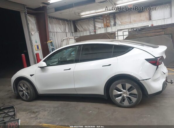 7SAYGDEE3PF608085 2023 TESLA MODEL Y White Սարքավորումների վահանակի տեսք