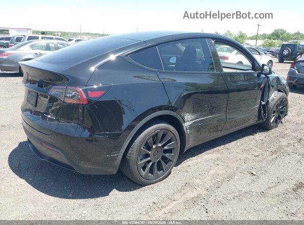 7SAYGDEE3RA244587 2024 TESLA MODEL Y Black Rear right