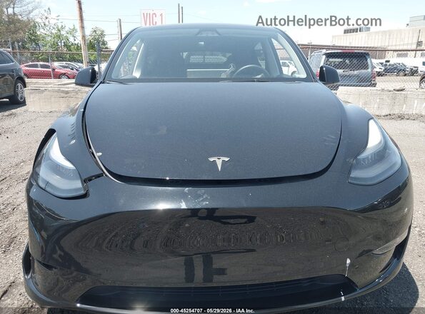 7SAYGDEE3RA244587 2024 TESLA MODEL Y Black Dashboard view