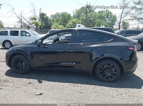 7SAYGDEE3RA244587 2024 TESLA MODEL Y Black Rear interior view
