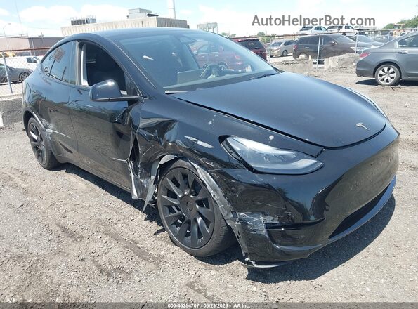 7SAYGDEE3RA244587 2024 TESLA MODEL Y Black Front view