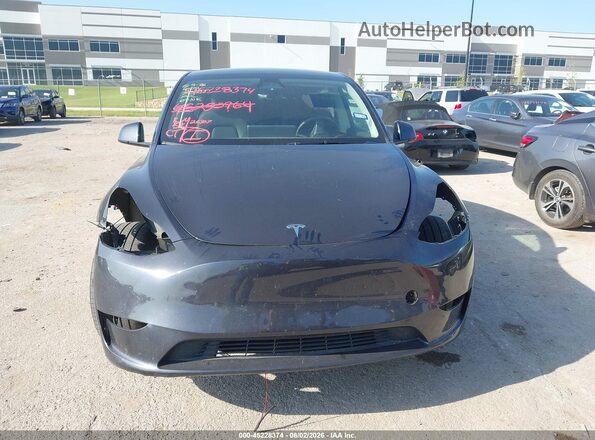 7SAYGDEE3RA301127 2024 TESLA MODEL Y Gray Dashboard view