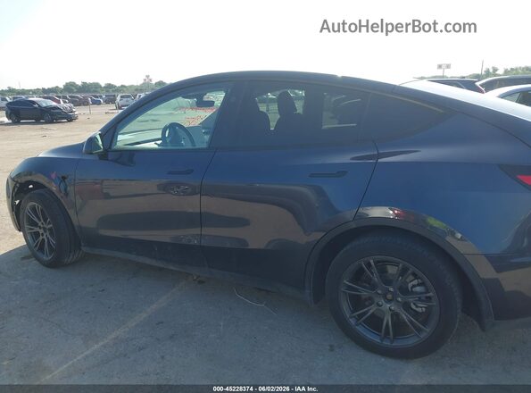7SAYGDEE3RA301127 2024 TESLA MODEL Y Gray Rear interior view