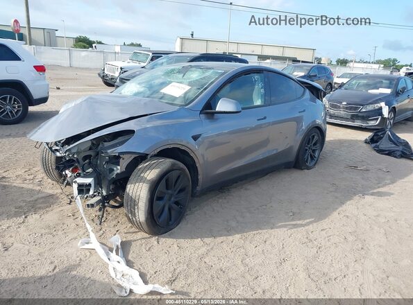 7SAYGDEE3RA327081 2024 TESLA MODEL Y Gray Vista tres cuartos delantera izquierda