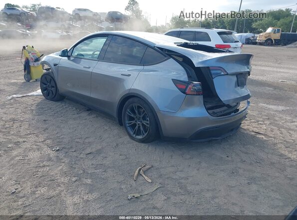 7SAYGDEE3RA327081 2024 TESLA MODEL Y Gray Trasero izquierdo